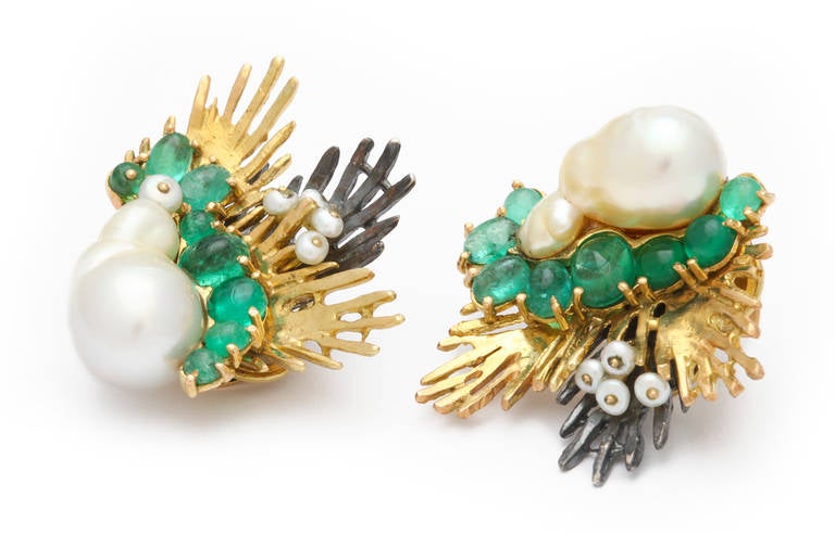 Cabochon emeralds with baroque and round pearls are stylishly combined and mounted in 18kt yellow gold and patinated silver.  One of a kind and purely Marilyn Cooperman.

Marilyn Cooperman is an exclusive New York based designer, who is well known
