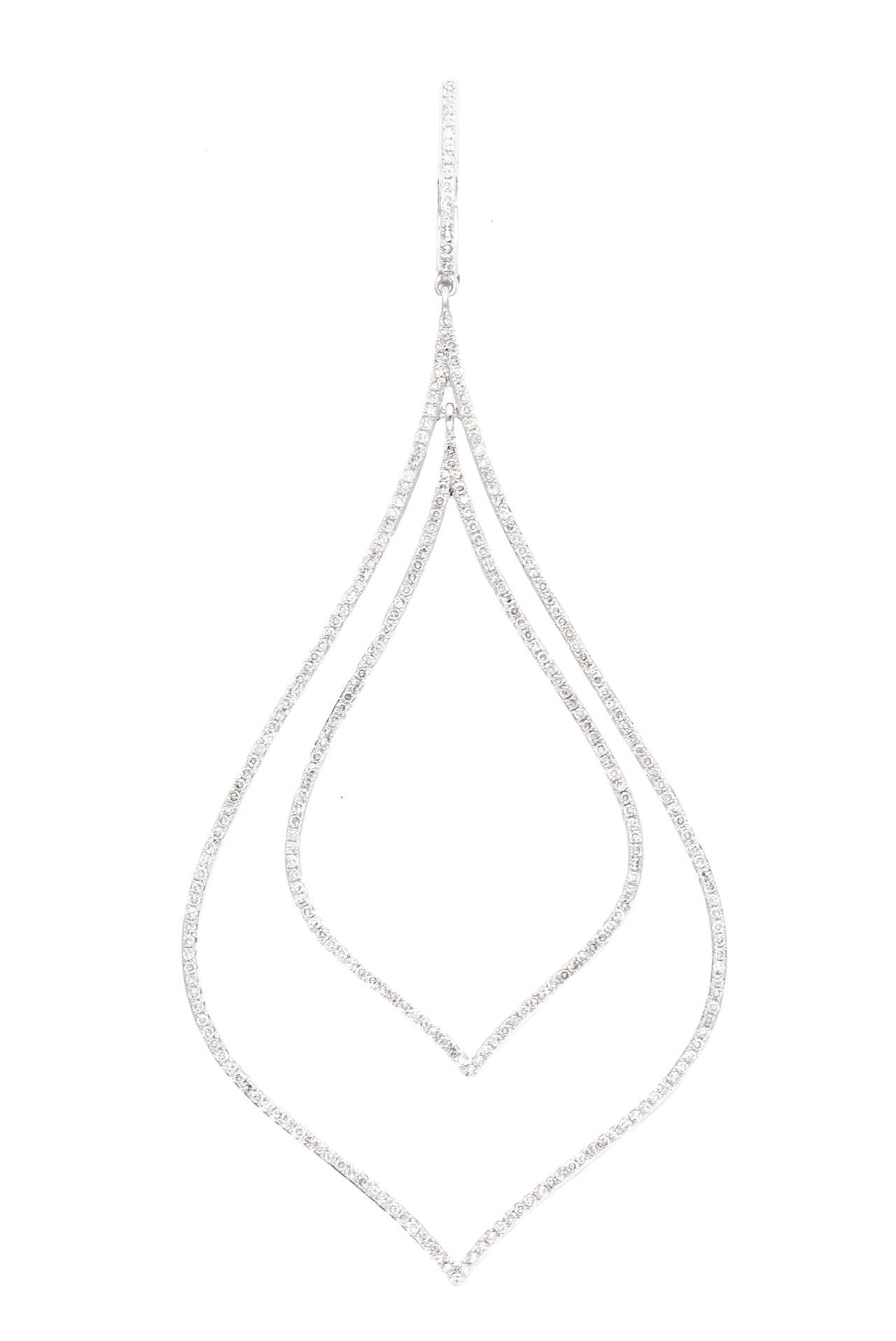 Carefully set with all full cut diamonds, these dramatic, double drops measure a full 3 1/2 inches in length.  While certainly dramatic, they are stylish and a light and airy pleasure to wear.