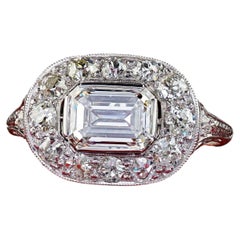 Antique Art Deco Platinum Emerald Cut Diamond Halo Engagement Ring - GIA