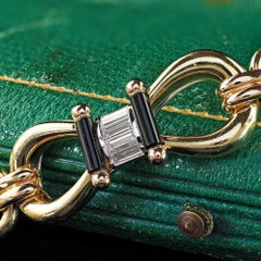 Pulsera vintage de la colección «Estate», de oro de tres tonos de 18 quilates, con diamantes Picchiotti y ónix, con diseño de bocado de caballo