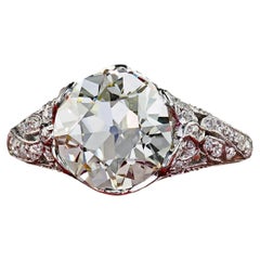 Anello di fidanzamento antico in stile edoardiano, in platino con diamanti "Old European" a motivo floreale - GIA