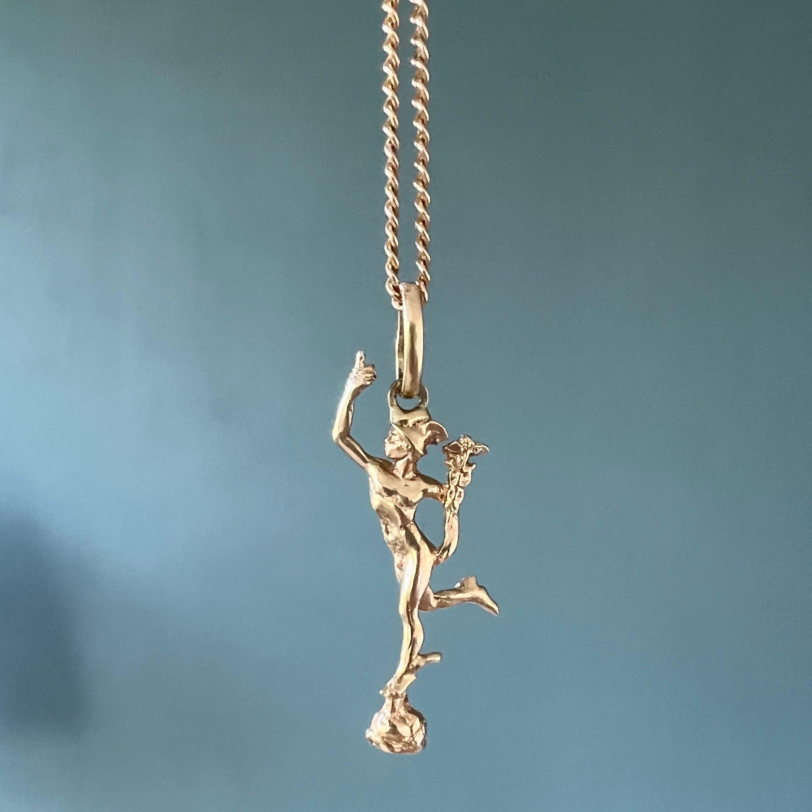 An 18 karat yellow gold Mercury (Hermès to the Greeks) charm pendant. This charm is a design based on the original statue by Italian designer Giovanni da Bologna (1529-1608). The flying Mercury is the Roman messenger of the ancient gods and patron