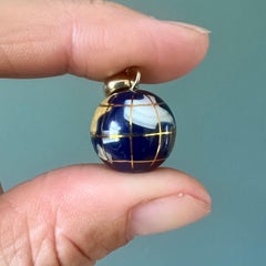 Gemstone and Enamel Gold Globe Pendant