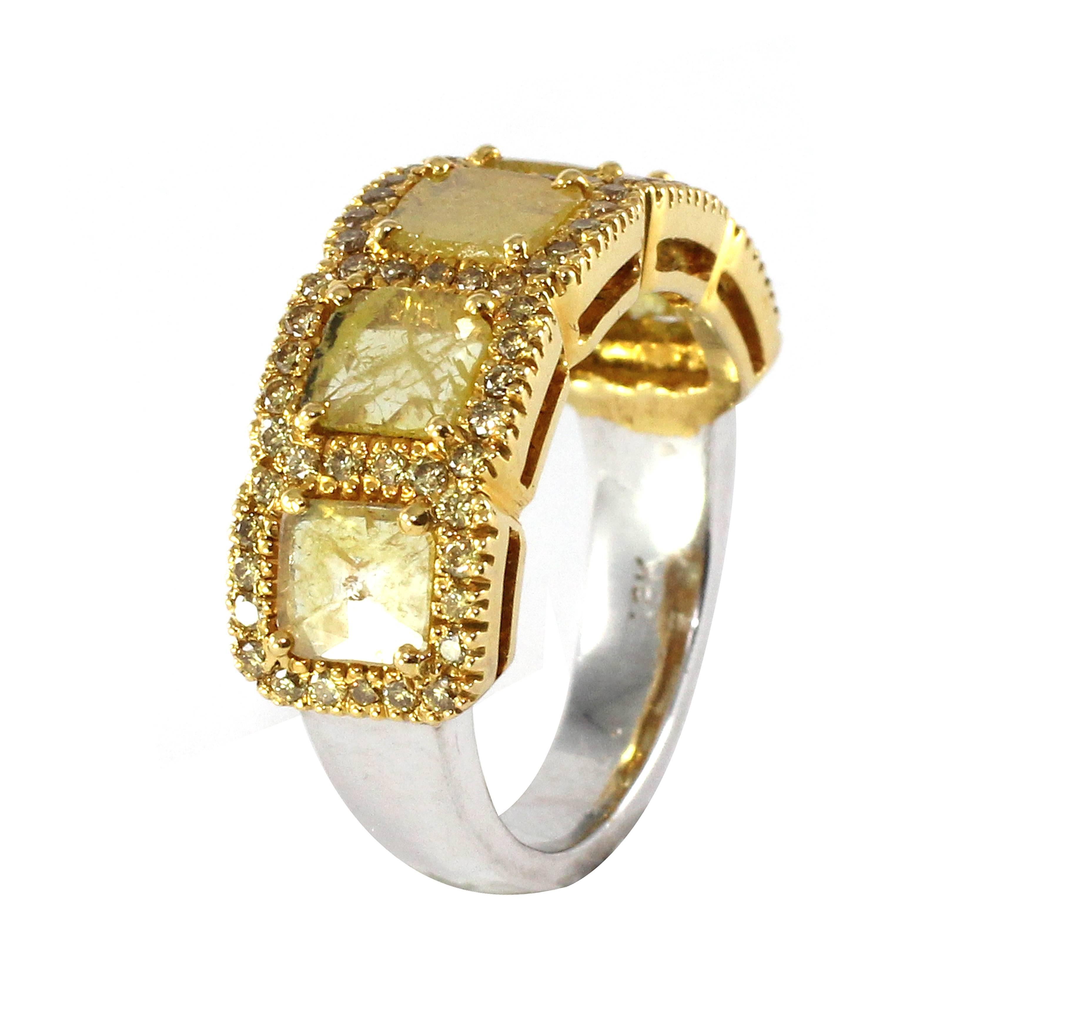 Yellow Slice Diamond Ring surrounded with Natural Yellow Diamonds with 1.56cts. of total diamond weight set  in 18k gold