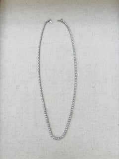 RIVIERA STYLE, collier « tennis » en diamants naturels ronds de 6,05 ct, or blanc 14 carats, 17 pouces