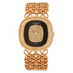 Vintage Patek Philippe Ellipse Model 4433/1 18 Karat Yellow Gold Onyx Diamond