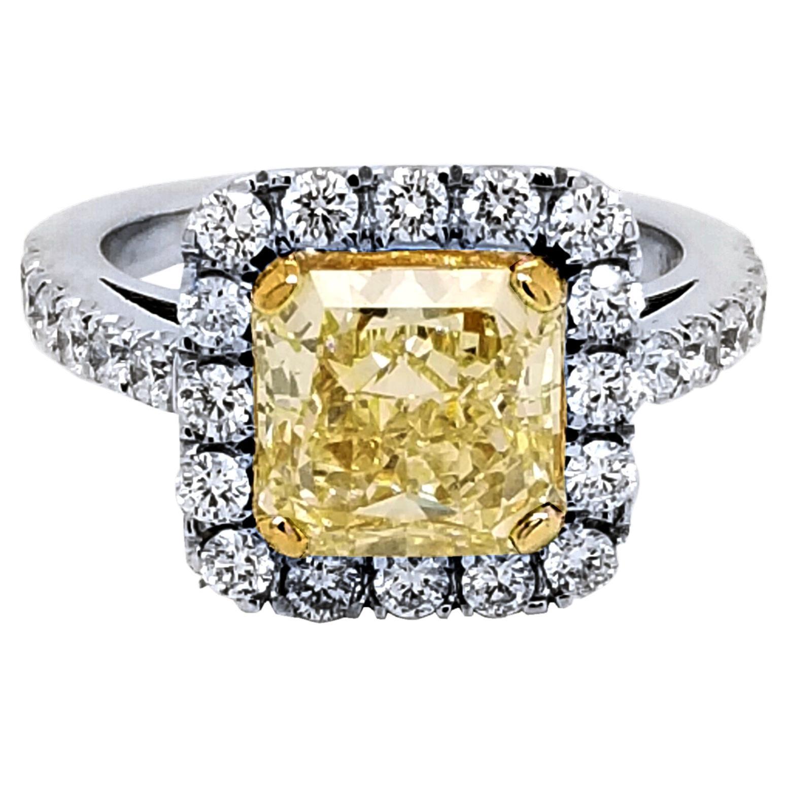 EGL 2.49 Ct Fancy Light Yellow Radiant Pave Set 18K Engagement Ring with Halo For Sale