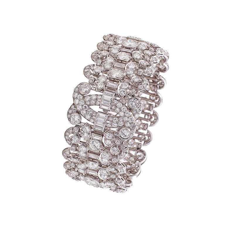 This exquisite flexible bracelet is constructed of repeating geometric patterns with 3 interlocking 