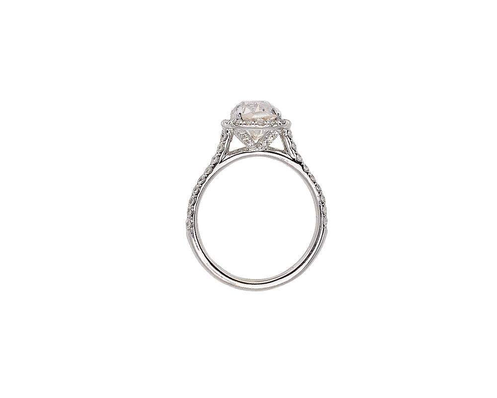 Perfect engagement ring or a special gift, this ring merges the best of the antique and contemporary worlds! This exquisite ring is set with a 2.15 carat cushion-cut diamond circa 1925, color: J-K, clarity: SI1,  in an 18 karat white gold