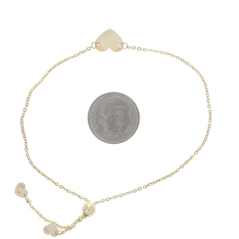 Bracciale Bolo a catena piatta con cuore in oro giallo - Amore 10k - Scivolare regolabile in vendita 1