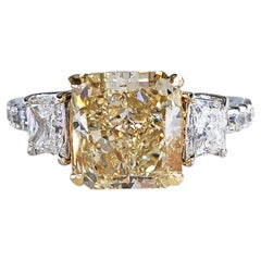 Bague à trois pierres GIA, diamants jaunes naturels taille coussin, en platine et or 18 carats