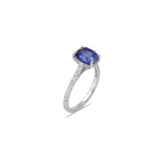 „Horizon“-Ring mit blauem Saphir als Solitär, verziert mit einem Diamanten, aus 18-karätigem Weißgold