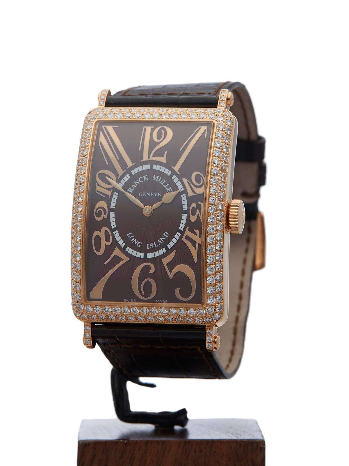 Ref: W3287
Model: 1200 SC D
Serial: 16
Condition: 9 - Excellent condition
Age:	20th September 2008
Case Diameter: 32 mm
Case Size: 32mm by 54mm
Box and Papers: Box and Guarantee
Movement: Automatic
Case: 18k Rose Gold
Dial: Brown
Bracelet: Brown