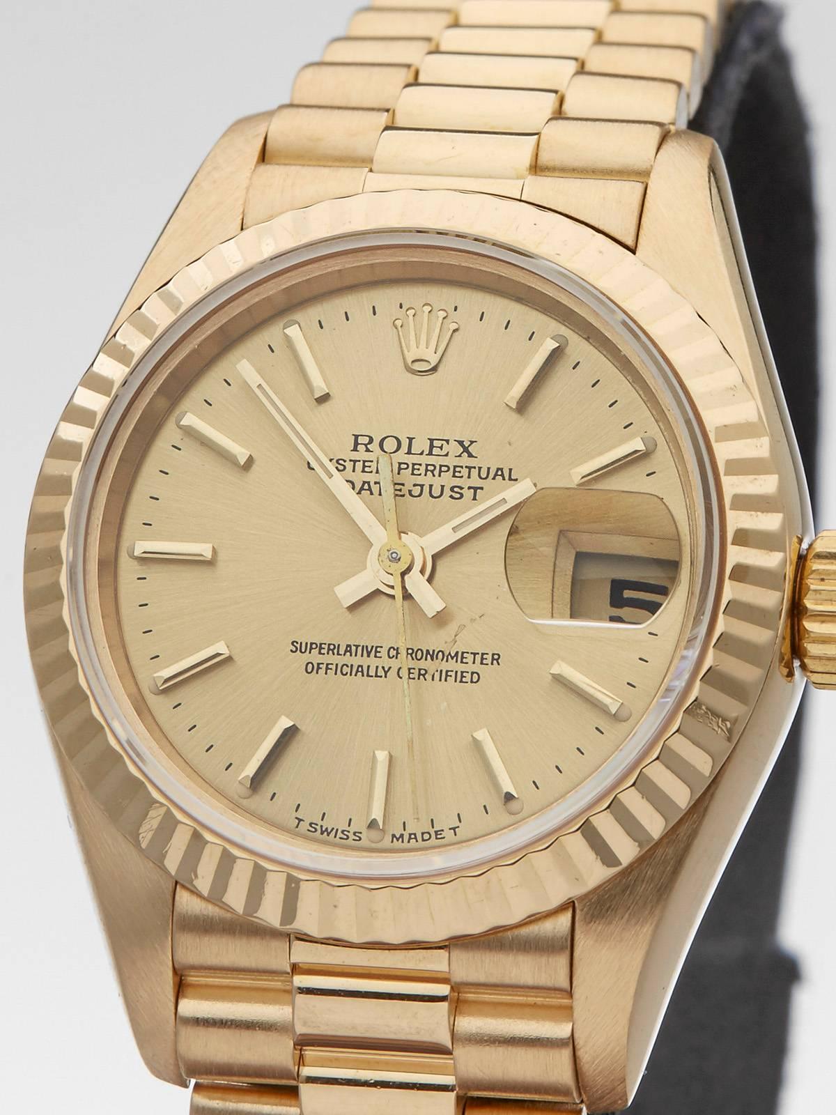Ref: W3391
Model: 79178
Serial: U19****
Condition: 9 - Excellent condition
Age: 1997
Case Diameter: 26 mm
Case Size: 26mm
Box and Papers: Box and Manuals 
Movement: Automatic
Case: 18k Yellow Gold
Dial: Champagne Baton
Bracelet: 18k Yellow