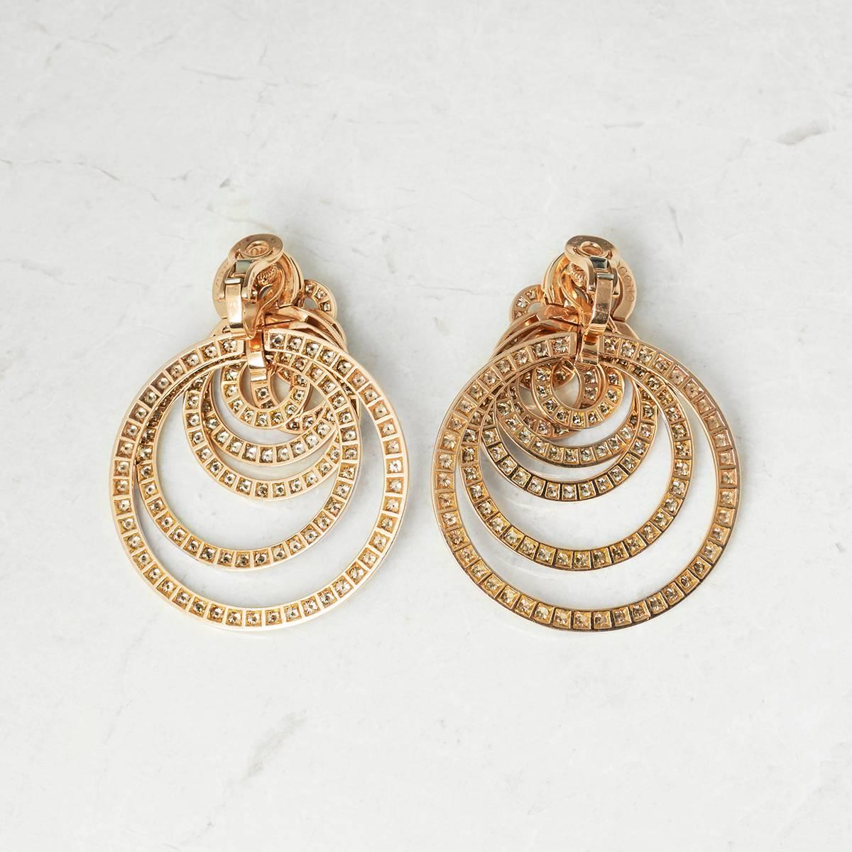 Ref:	COM931
Model Number: 10096/07
Serial Number: B 6****
Age: 2012
Size: Length of Earrings - 5.9cm, Width of Earrings - 4.5cm
Box & Papers: De Grisogono Certificate of Authenticity dated 05/12/2012, De Grisogono Certificate for Insurance dated