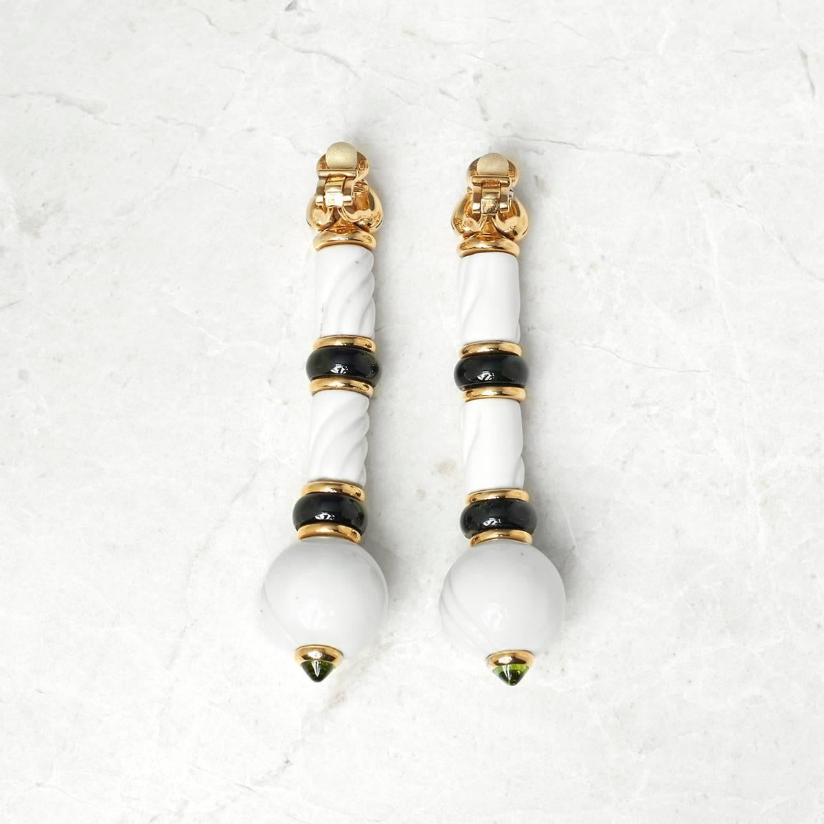 Code: COM936
Brand: Bulgari
Description: 18k Yellow Gold & Porcelain Green Tourmaline Chandra Earrings
Accompanied With: Box Only
Gender: Ladies
Earring Length: 7.2cm
Earring Width: 1.7cm
Earring Back: Omega
Condition: 9
Material: Other
Total