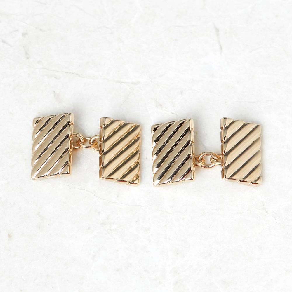 Code: COM962
Brand: Tiffany & Co.
Description:  14k Yellow Gold Striped Retro Cufflinks
Accompanied With: Tiffany & Co. Box
Gender: Mens
Condition: 9
Material: Yellow Gold
Total Weight: 16.10g