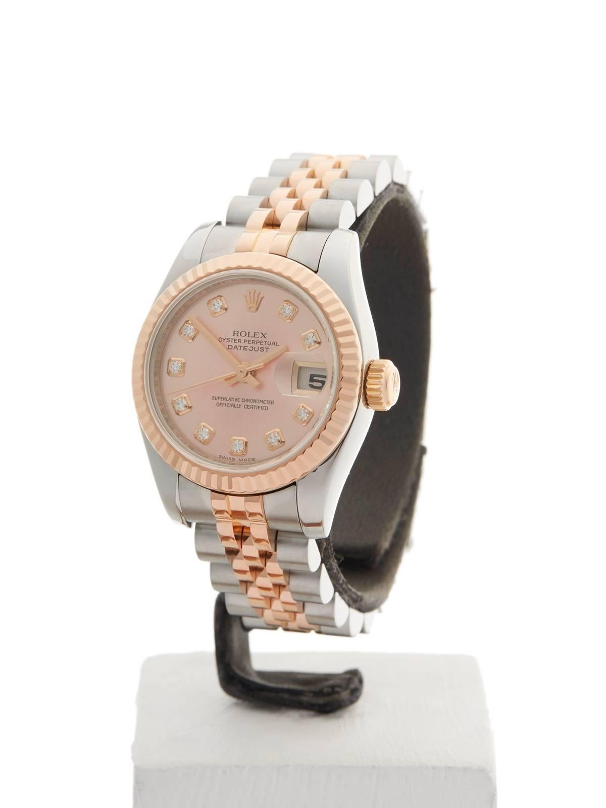 Ref: W3581
Model: 179171
Serial: D37****
Condition:  9 - Excellent condition
Age: 5th March 2007
Case Diameter: 26 mm
Case Size: 26mm
Box and Papers: Box, Manuals and Guarantee
Movement: Automatic
Case: Stainless Steel & 18k Rose Gold
Dial: Pink