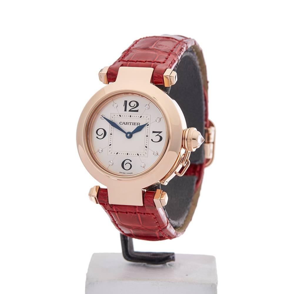 
Ref: W4127
Model Number: 2812
Serial Number: 122*****
Condition: 9 - Excellent condition
Age:	2010's
Case Diameter: 32 mm
Case Size: 32mm
Box And Papers: Box Only
Movement: Quartz
Case: 18k Rose Gold
Dial: Silver Diamonds
Bracelet: Red