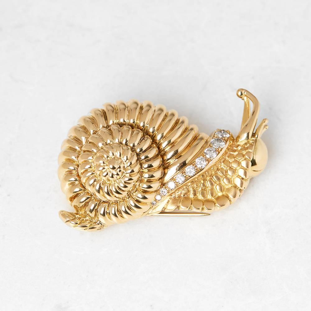 Code: J609
Brand: Rene Boivin
Description:  18k Yellow Gold Diamond Snail Brooch
Accompanied With: Presentation Box
Gender: Ladies
Brooch Length: 3.5cm
Brooch Width: 5.5cm
Condition: 8
Material: Yellow Gold
Total Weight: 782.60g