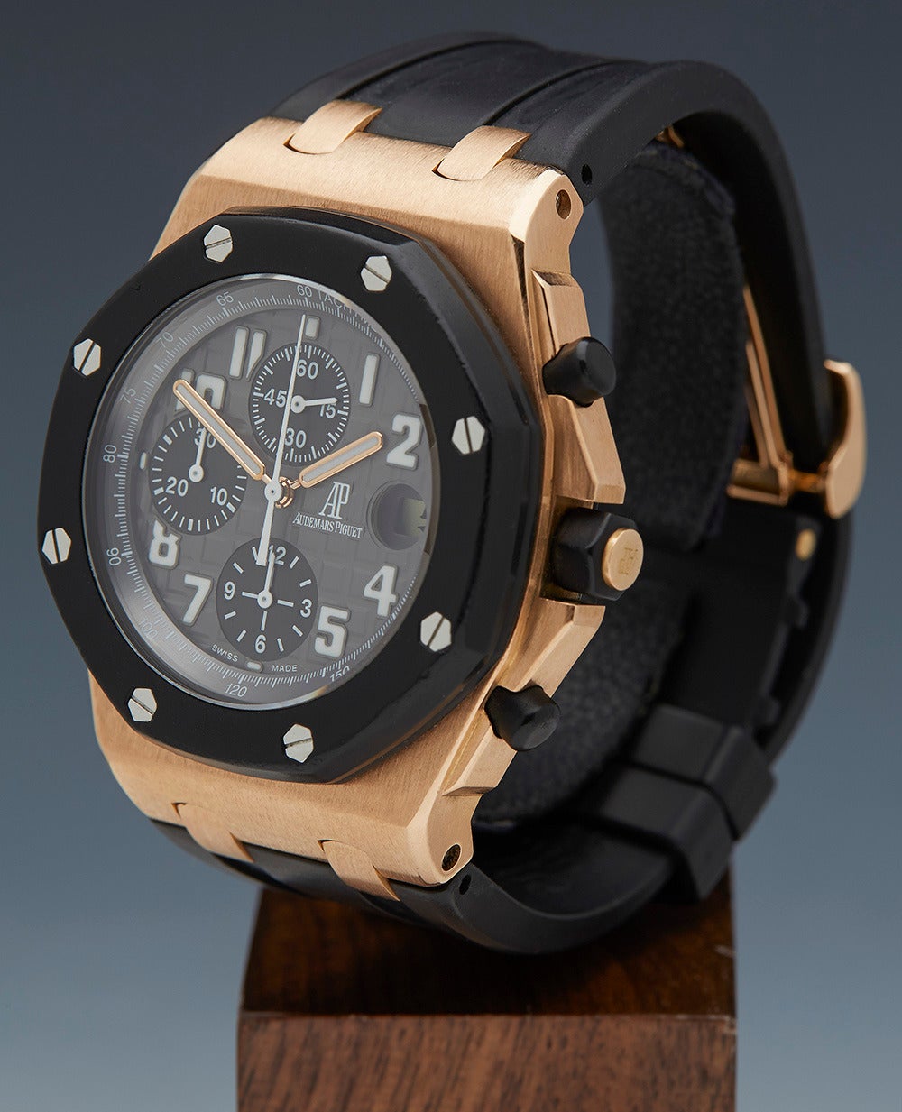 Specifications

Movement: Automatic
Case: 18k Rose Gold
Case Size: 42mm 
Dial: Black
Bracelet: Black Rubber
Buckle: Deployment
Glass: Sapphire Crystal
Water Resistance: To Manufacturers Specifications
Age:  2011
Box & Papers: Box and