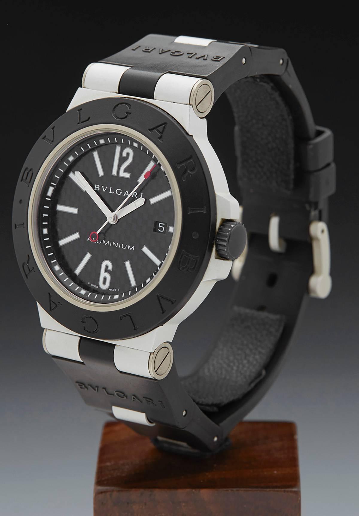 Specifications

Movement: Automatic 
Case: Aluminium
Case Diameter: 34mm
Dial: Black
Bracelet: Black Rubber
Buckle: Tang
Glass: Sapphire Crystal
Water Resistance: To Manufacturers Specification 
Age: 12th December 2006
Box & Papers: 	Box,