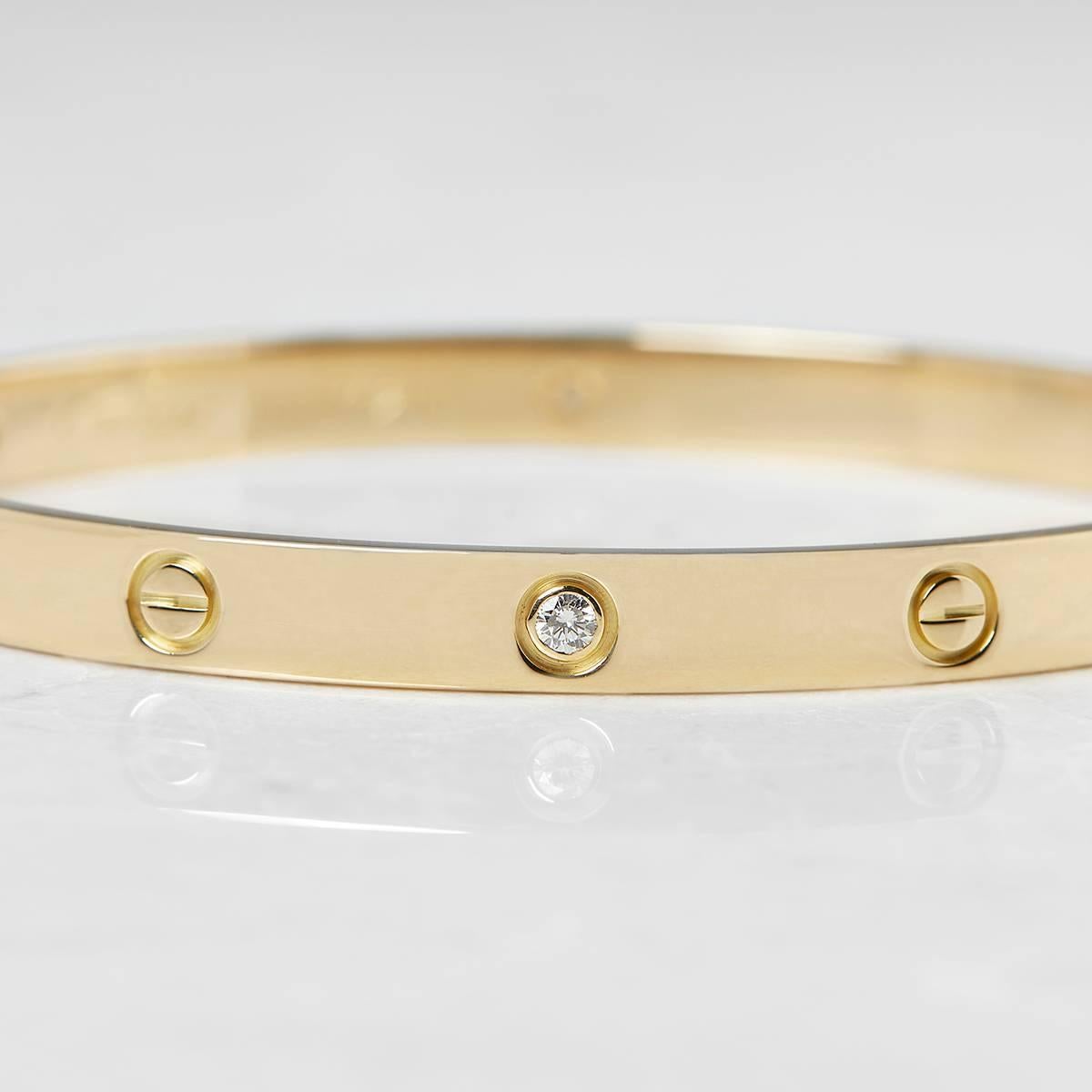 cartier gold bangle with diamonds