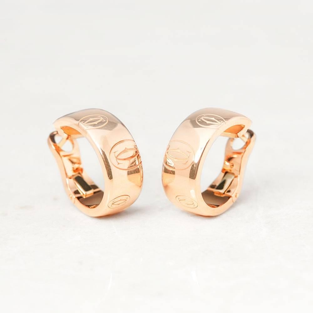 Ref:	COM1007
Serial Number: FC9***
Size: Earring Length - 1.8cm, Earring Width - 8mm
Box & Papers: Xupes Presentation Box
Material: 18k Rose Gold, total weight - 17.50 grams
Condition:  9 - Excellent Condition

These Earrings by Cartier are from