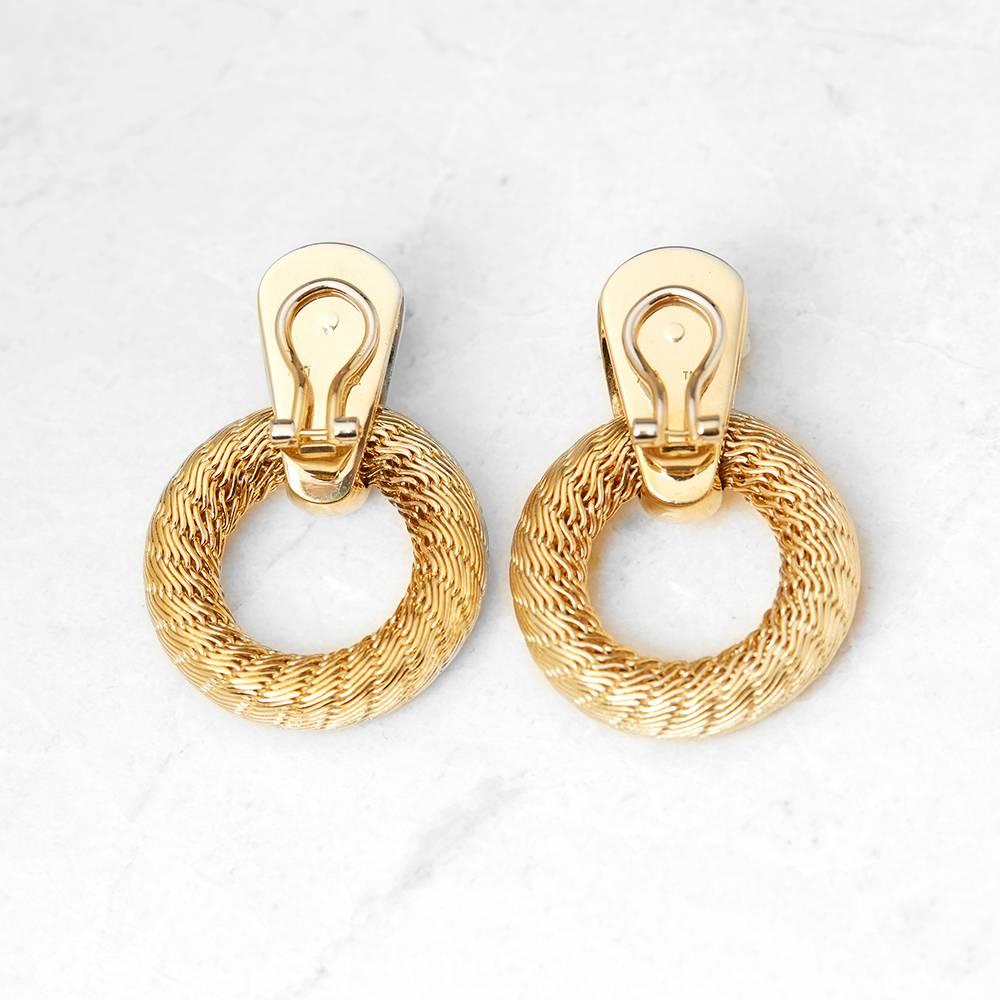 Xupes Code: COM1049
Brand: Tiffany & Co.
Description: 18k Yellow Gold Woven Hoop Ear Clips
Accompanied With: Xupes Presentation Box
Gender: Ladies
Earring Length: 3.7cm
Earring Width: 2.6cm
Earring Back: Clip-on
Condition: 9
Material: Yellow