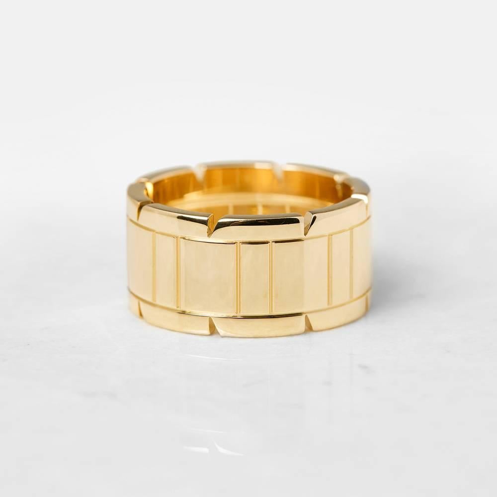 Ref:	COM1085
Serial Number: GT ****
Age:	2000's
Size: R, Band Width - 1.1cm
Box & Papers: Xupes Presentation Box
Material: 18k Yellow Gold, total weight - 14.04 grams
Condition: 9 - Excellent condition

This Ring by Cartier is from their Tank