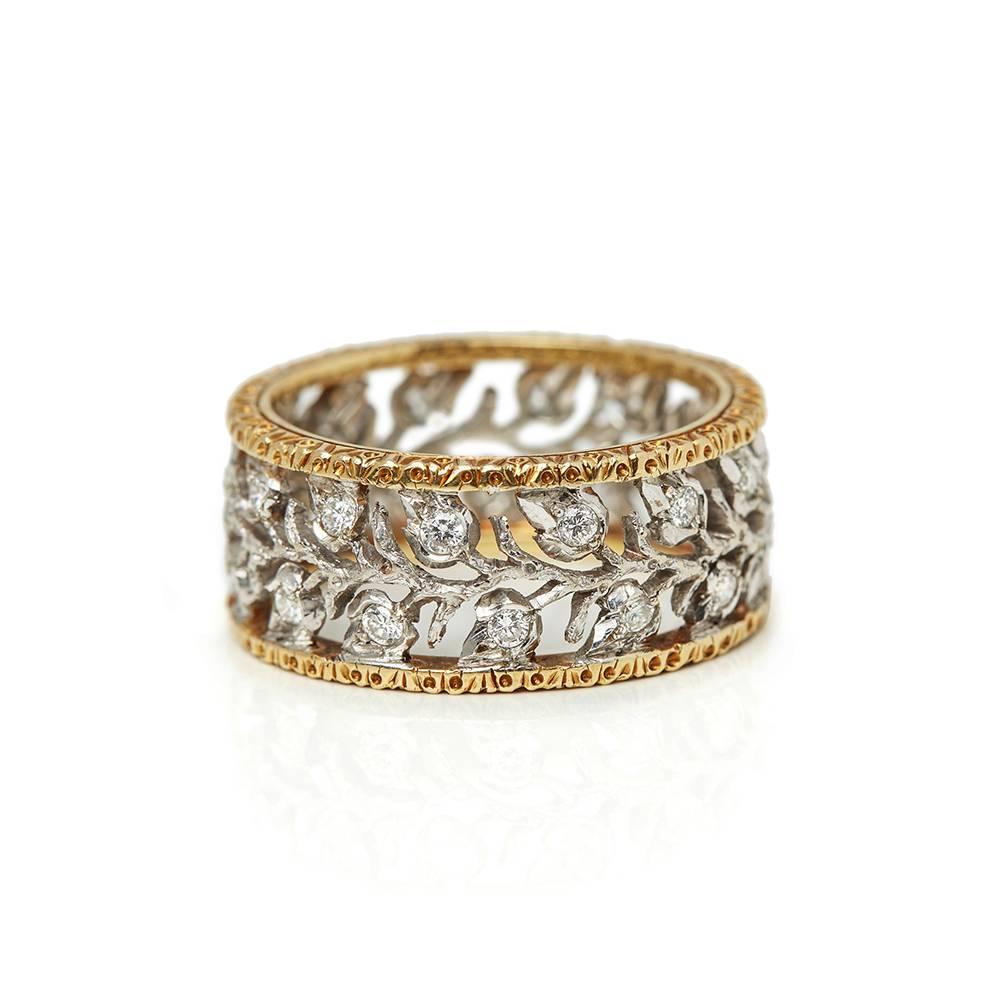 Ref:	COM1328
Age: 2000's
Size:	 O 1/2, Band Width - 9mm
Box & Papers: Xupes Presentation Box
Material: 18k White Gold & 18k Yellow Gold, total weight - 6.48 grams
Gemset: Set with 28 round brilliant cut Diamonds of approximately 0.50ct total Colour