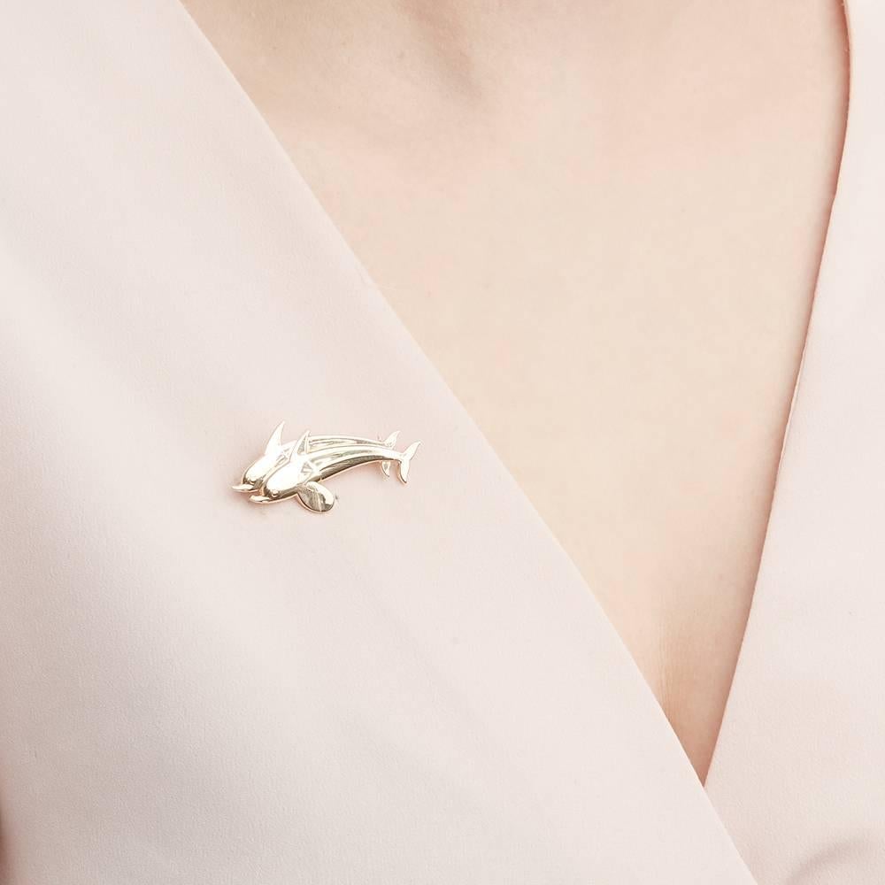 Code: COM1457
Brand: Georg Jensen
Description: 18k Yellow Gold Dolphin Brooch
Accompanied With: Presentation Box
Gender: Ladies
Brooch Length: 2.1cm
Brooch Width: 3.7cm
Condition: 8
Material: Yellow Gold
Total Weight: 5.13g