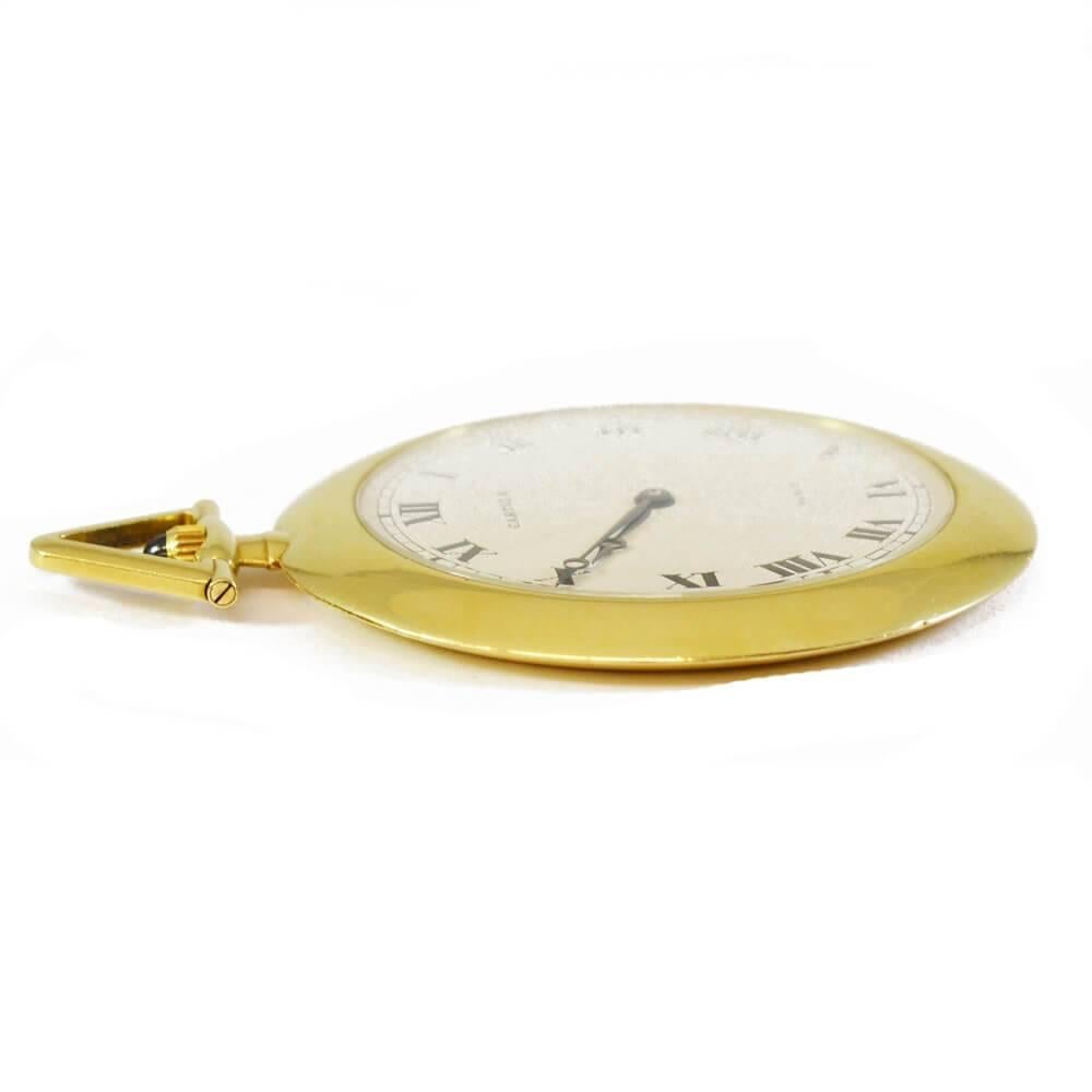 Classic Cartier gold pocket watch with black Roman numerals on a white face. 18ct yellow gold case. French, circa 1970.