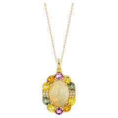 Sunita Nahata Opal 7.14ct. & Mix Sapphire Pendant in 18KYG with Diamond.