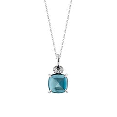 Sunita Nahata Blue Topaz 5.90ct. Pendant in 14Karat White Gold with Diamond.