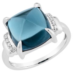 Sunita Nahata Blue Topaz 7.40ct. Fancy Ring in 14KWG with Diamond.
