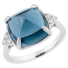 Sunita Nahata Blue Topaz 7.71ct. Fancy Ring in 14KWG with Diamond.