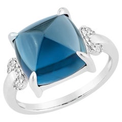 Sunita Nahata Blue Topaz 7.65ct. Fancy Ring in 14KWG with Diamond.
