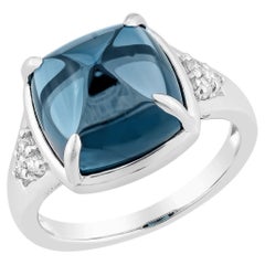 Sunita Nahata Blue Topaz 7.81ct. Fancy Ring in 14KWG with Diamond.