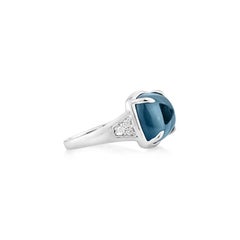Sunita Nahata Blue Topaz 7.81ct. Fancy Ring in 14KWG with Diamond.