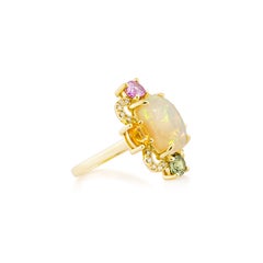 Sunita Nahata Opal 2.44ct. & Mix Sapphire Cocktail Ring in 18KYG with Diamond.