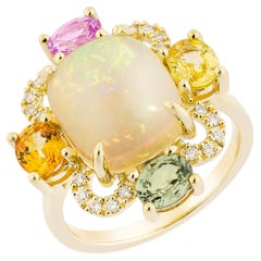 Sunita Nahata Opal 3.60ct. & Mix Sapphire Cocktail Ring in 18KYG with Diamond.