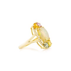 Sunita Nahata Opal 3.60ct. & Mix Sapphire Cocktail Ring in 18KYG with Diamond.
