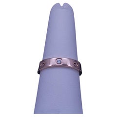 Anello Cartier Love in oro rosa con 1 diamante incastonato