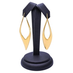 Orecchini a cerchio “Half Twist” in oro 18 carati di Michael Good