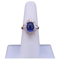 Bague « ballerine » vintage avec saphir bleu ovale en cabochon et diamants en baguette