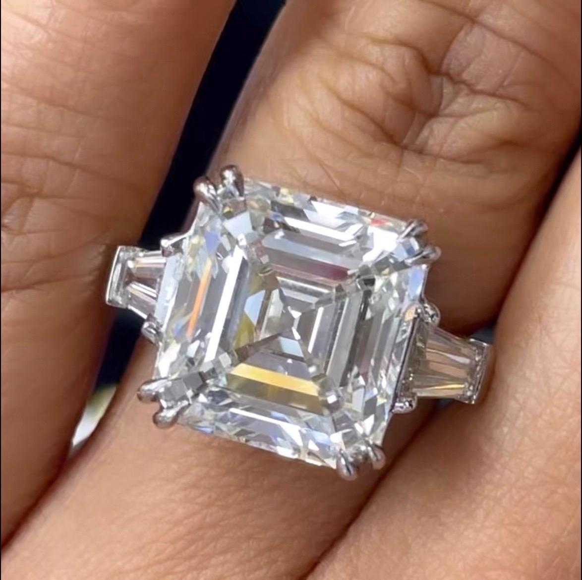 A bold and daring ring designed and created for a power person, this 10 carat Emerald Ring with baguette accents is a statement and emerald cut lover's dream. The depth of 63.6% makes it appear larger for its size and whiter for its color grade