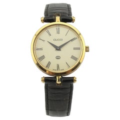 Reloj Gucci 2000M vintage chapado en oro, esfera romana color crema, hebilla original, 30 mm, G55