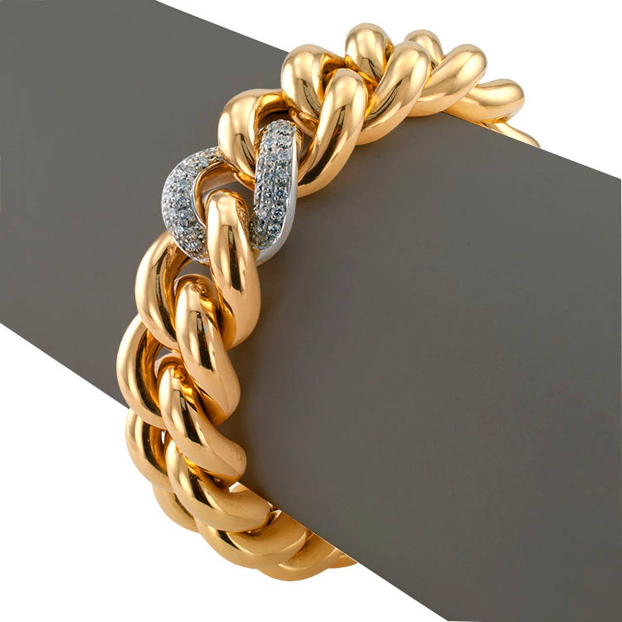 Nicolis Cola Chunky Link Gold and Diamond Bracelet

Chunky link bracelet, circa 2000.  A marvelous design that looks and feels great.  Just so... so elegant, so smart, so good on the wrist, a strong contender for 