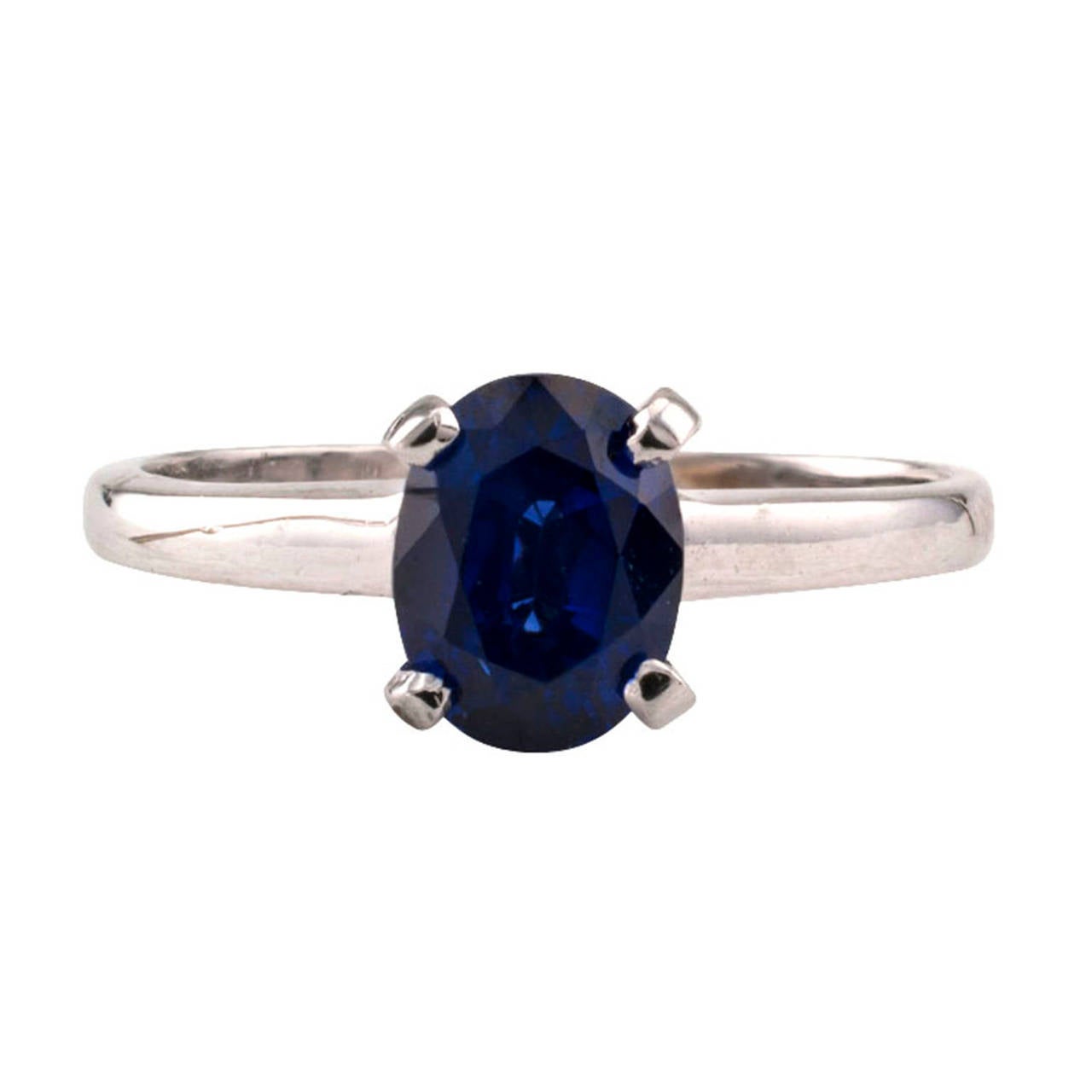 1.62 Carats Blue Sapphire Solitaire Ring
Estate Blue Sapphire ring.   Across the centuries, blue sapphires have been associated with nobility, truth, sincerity and faithfulness.  This marvelous solitaire ring showcases a really beautiful bright and